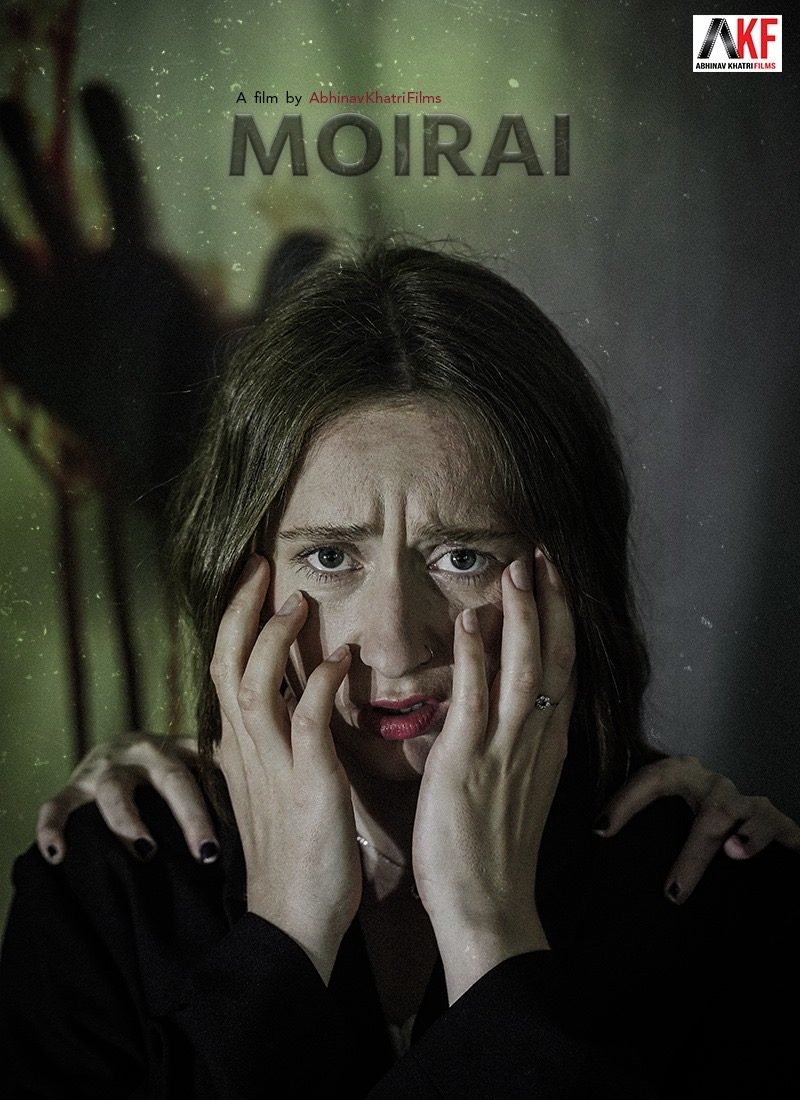 Poster for Moirai: a frightened woman with hands on her shoulders
