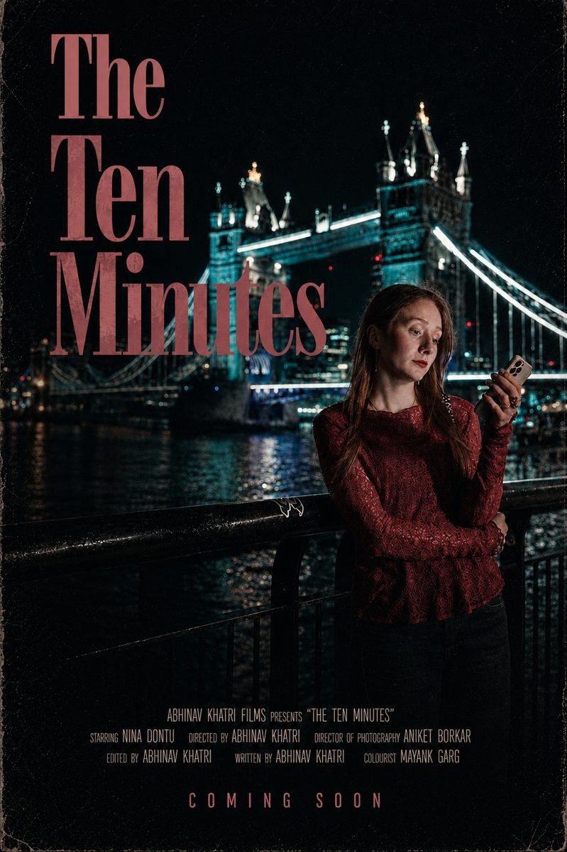 Poster for The Ten Minutes: a woman on her phone by Tower Bridge at night